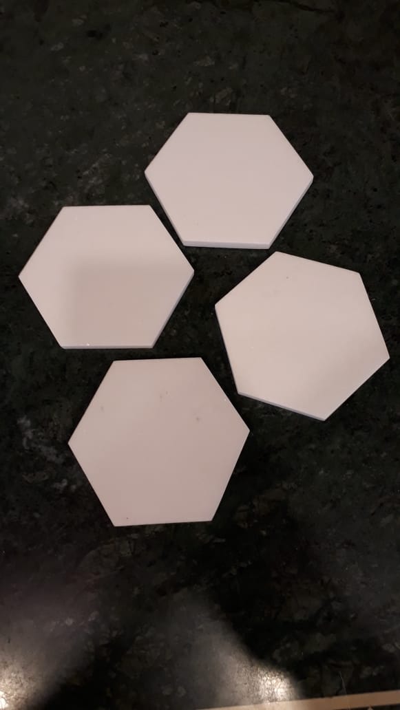 Opulent Homes White Marble Hexagon Coasters set of 4